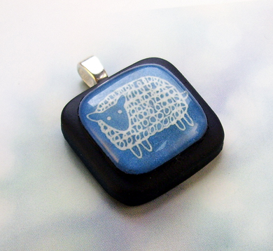 Little Blue Sheep on black pendant