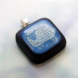 Little Blue Sheep on black pendant